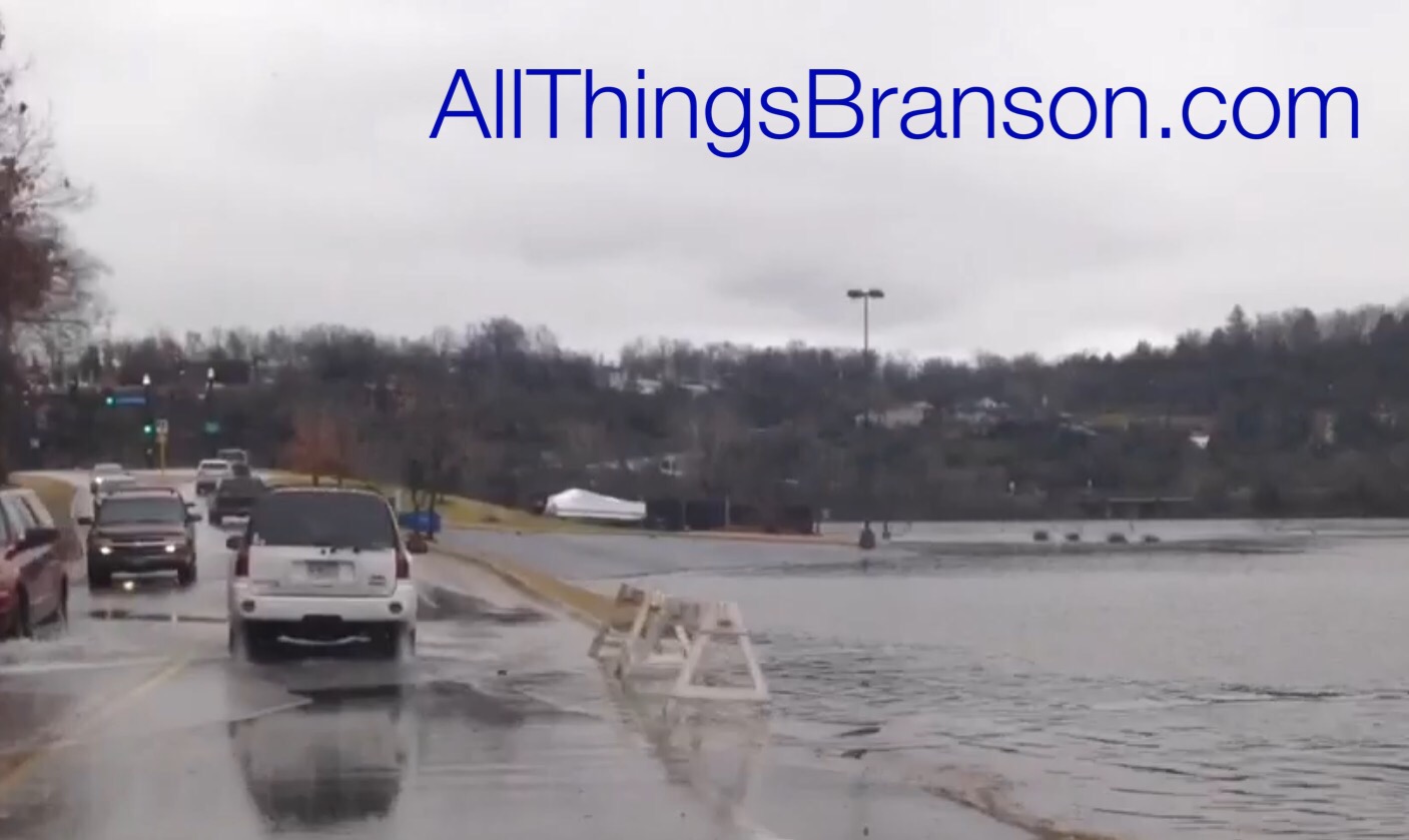 WARNING: Branson Landing Parking Lot Flooding Road